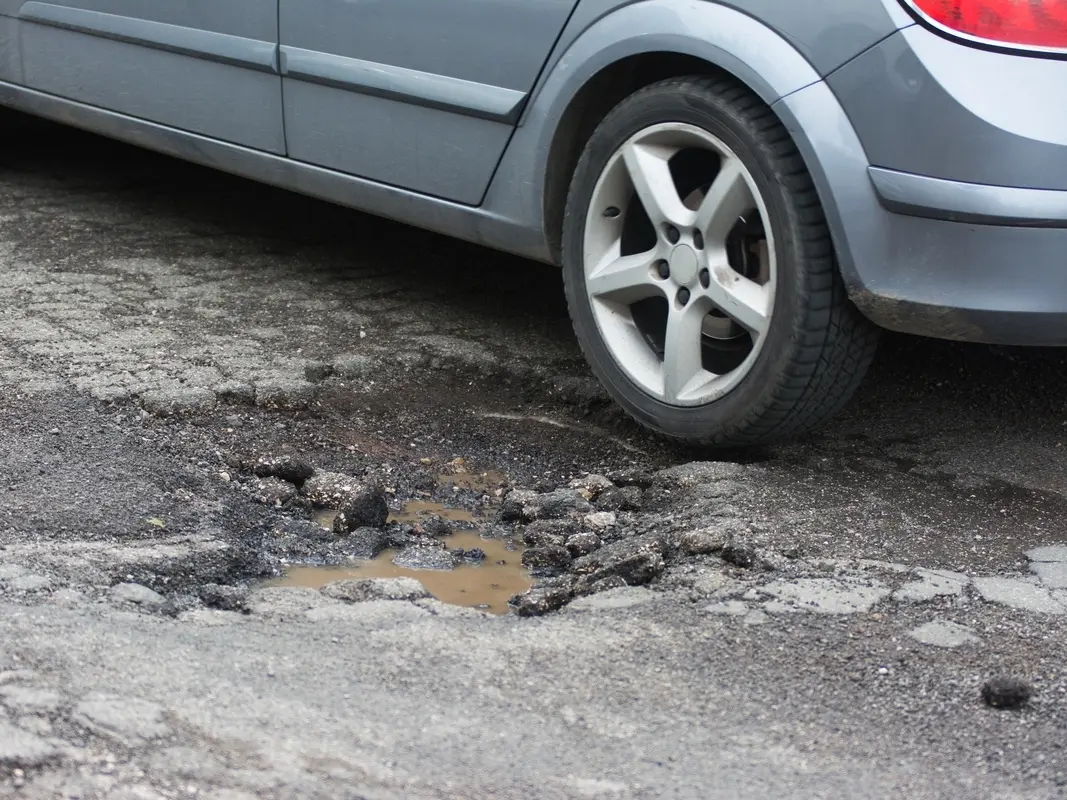 How to Report and Recoup Damages from Potholes
